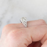 Trilogy Art Déco in oro bianco 18K con diamanti di taglio vecchio (1.60ctw ca.), anni ‘30/‘40