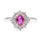 ANELLO A MARGHERITA IN PLATINO CON RUBINO (1.011 CT) E DIAMANTI (0.70 CTW)