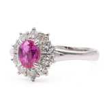 ANELLO A MARGHERITA IN PLATINO CON RUBINO (1.011 CT) E DIAMANTI (0.70 CTW)