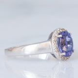 Anello a margherita vintage in oro bianco 18K con tanzanite (2.30ct ca.) e diamanti di taglio brillante (0.20ctw ca.), anno ‘70/‘80