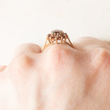 Anello a margherita vintage in oro giallo 9K con granati (1ctw ca.), anni ‘70