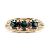 Anello trilogy vintage in oro giallo 8k con spinelli sintetici verdi