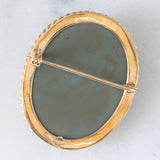 Spilla antica in oro giallo 18K con cammeo su lava rappresentante la dea Diana, fine ‘800