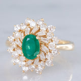 Anello ballerina vintage in oro giallo 14K con smeraldo (0.50ct ca.) e diamanti di taglio brillante e tapered (0.96ctw ca.), anni ‘80