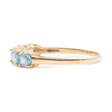Anello vintage a riviera in oro giallo 9k con topazi azzurri