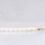 Collana vintage di perle bianche con chiusura in oro giallo 18K, anni ‘60/‘70