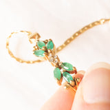 Braccialetto semirigido in oro giallo 14K con smeraldi (0.50ctw ca.) e diamanti (0.02ctw ca.), anni ‘70/‘80