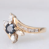 Anello a fiore vintage in oro giallo 14K con zaffiro (0.50ct ca.) e diamanti (0.90ctw ca.), anni ‘70/‘80