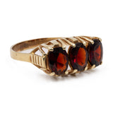 Anello vintage trilogy in oro giallo 14k con granati