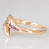 Anello contrarier antico a doppio serpente in oro giallo 14K con smeraldi, rubini e diamanti di taglio vecchio (0.16ctw ca.), anni ‘20