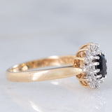Anello a margherita vintage in oro giallo 9K con zaffiro (0.45ct ca.) e diamanti (0.10ctw ca.), anni ‘80