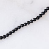 Collana moderna con onice e oro giallo 18K