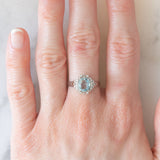 Anello a margherita vintage in platino con acquamarina (1.09ct) e diamanti (0.10ctw), anni ‘80/‘90