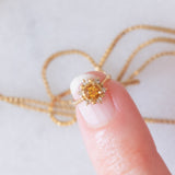 Collana vintage con ciondolo ad anello a margherita in oro giallo 18K con quarzo citrino e diamanti, anni ‘80