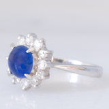 Anello a margherita vintage in platino con zaffiro (1.20ct) e diamanti (0.40ctw), anni ‘70/‘80