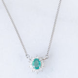 Collier vintage in platino con ciondolo a margherita con smeraldo (0.35ct) e diamanti (0.23ctw)