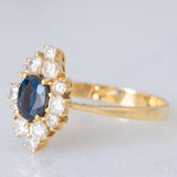 Anello a margherita navette in oro giallo 18K con zaffiro (1ct ca.) e diamanti di taglio brillante (0.75ctw ca.), anni ‘60/‘70