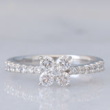 Anello a fiore vintage in platino con diamanti di taglio brillante (0.45ctw), anni ‘90