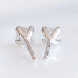 Orecchini punto luce in oro bianco 18K con diamanti di taglio brillante (0.44ctw ca.)