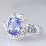 Anello a margherita vintage in platino con tanzanite (2.04ct) e diamanti di taglio brillante e baguette (1.35ctw), anni ‘90