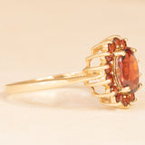 Anello a margherita vintage in oro giallo 9K con granati (1.40ctw ca.), anno 2006