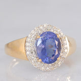 Anello a margherita vintage in oro giallo e bianco 14K con tanzanite (2.10ct ca.) e diamanti (0.30ctw ca.), anni ‘80