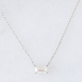 Collana vintage in platino con diamante di taglio smeraldo (0.30ct)