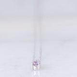 Collana vintage in oro bianco 10K con ciondolo punto luce con zaffiro rosa e diamante