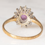 Anello a margherita vintage in oro giallo 9K con rubino (0.40ct ca.) e diamanti (0.28ctw ca.), anno 1987