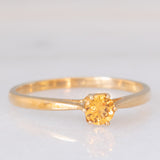 Solitario vintage in oro giallo 9K con spessartite (0.27ct ca.)