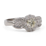 Anello vintage in platino 900 con diamante centrale di 0,46ct e contorno di 0,47ctw
