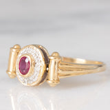 Anello doppio girevole in oro giallo 14K con rubino (0.20ct ca.)/smeraldo (0.14ct ca.) e diamanti, anni ‘80