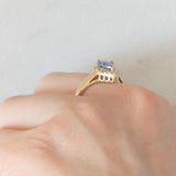 Anello a margherita vintage in oro giallo e bianco 9K con tanzanite (0.60ct ca.), anni ‘90