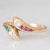 Anello contrarier antico a doppio serpente in oro giallo 14K con smeraldi, rubini e diamanti di taglio vecchio (0.16ctw ca.), anni ‘20