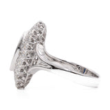 Anello a margherita navette in oro bianco 14K con zaffiro (1ct ca.) e diamanti (0.72ctw ca.), anni ‘70/‘80