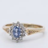 Anello a margherita vintage in oro giallo 9K con zaffiro (0.36ct ca.) e diamanti (0.12ctw ca.), anno 1989