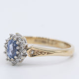 Anello a margherita vintage in oro giallo 9K con zaffiro (0.36ct ca.) e diamanti (0.12ctw ca.), anno 1989
