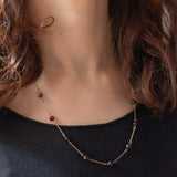 Collana vintage in oro giallo 8K e granati, anni ‘50/‘60