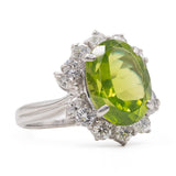Anello a margherita vintage in platino con peridoto (5.64ct) e diamanti (1.05ctw), anni ‘90