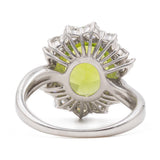 Anello a margherita vintage in platino con peridoto (5.64ct) e diamanti (1.05ctw), anni ‘90
