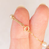 Collana vintage in oro giallo 18K con perle bianche