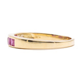 Anello vintage in oro giallo 18K con diamante (0.08ct ca.) e rubini di taglio carrè, anni '70