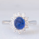 Anello a margherita vintage in platino con zaffiro (1.20ct) e diamanti (0.40ctw), anni ‘70/‘80