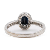 Anello vintage a margherita in oro bianco 9k con zaffiro e diamanti
