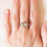 Anello antico in oro giallo 11K e argento con diamante centrale (1.50ct ca.) e rosette, primi del '900