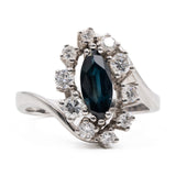 Anello vintage a margherita in oro bianco 14k con zaffiro marquise (1ct) e diamanti (0,60ctw), anni '70