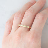 Veretta vintage in oro giallo 9K con peridoti (0.40ctw ca.), anni ‘70/‘80