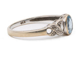 Anello vintage in oro bianco 9k con topazio e diamanti