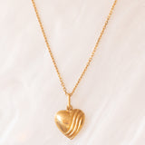 Collana francese vintage con catenina in oro giallo 18K e con tre ciondolo in oro giallo 18K