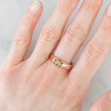 Solitario antico a fascia in oro giallo 14K con diamante di taglio rosetta (0.25ct ca.), primi del ‘900